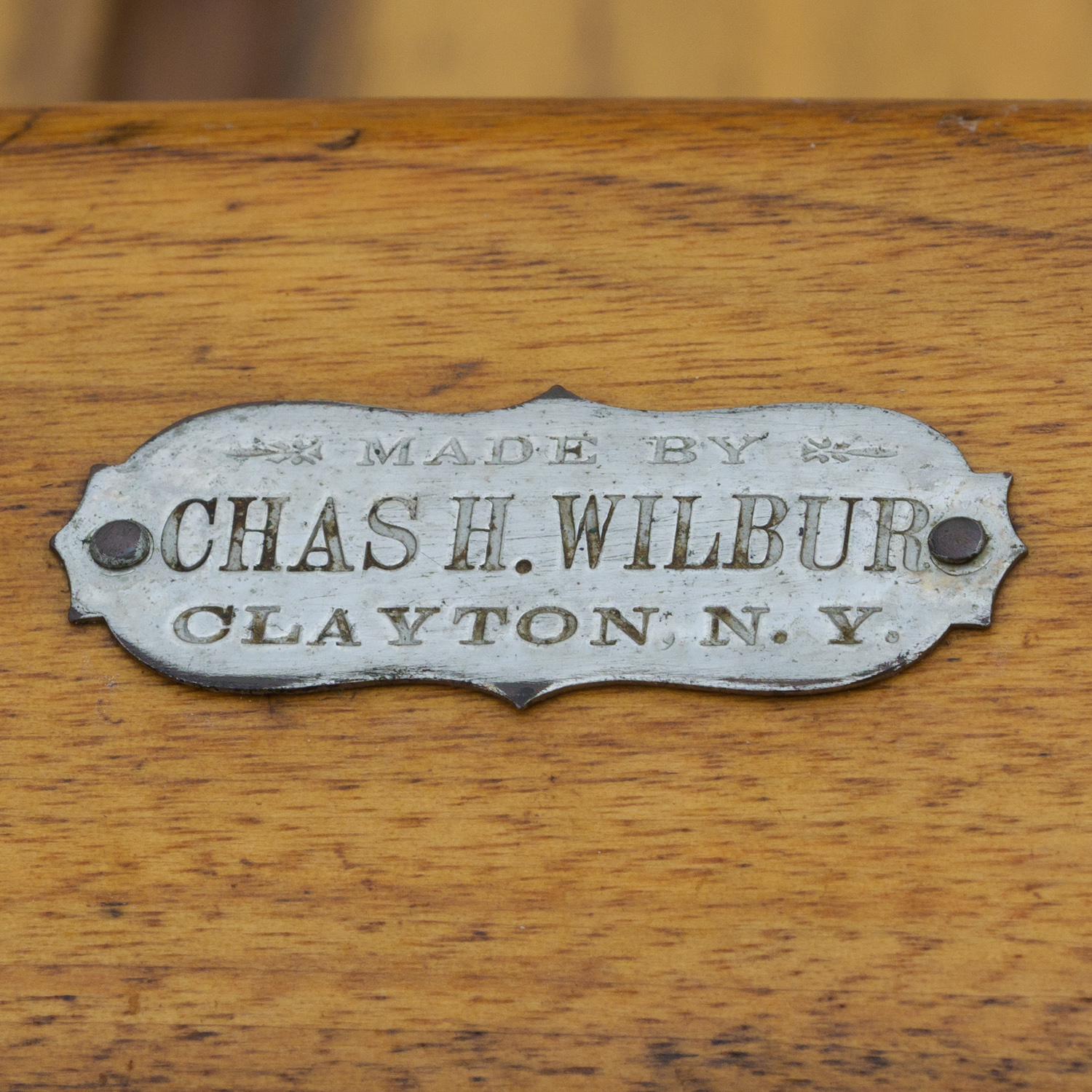 Chas. Wilbur tag